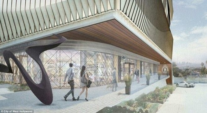 Tòa nhà được trang trí bằng kính và các thanh nhôm tản nhiệt xung quanh tạo vẻ đẹp hiện đại và lộng lẫy.